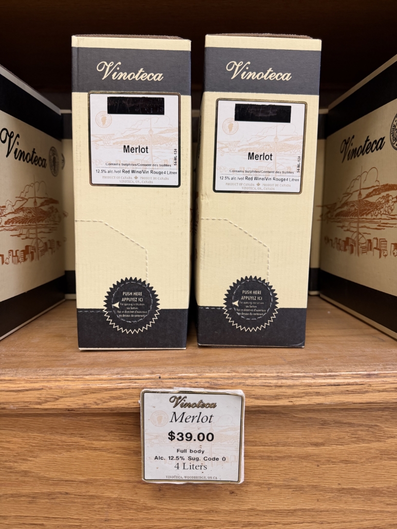 Two boxes of Vinoteca Merlot wine.